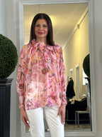 Blusa Floreale con Volaint al Collo