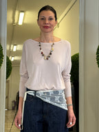 Tensione In Maglia con Scollo Profondo a V sulla Schiena